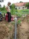 Slotted pipe and gravel in place in first trench